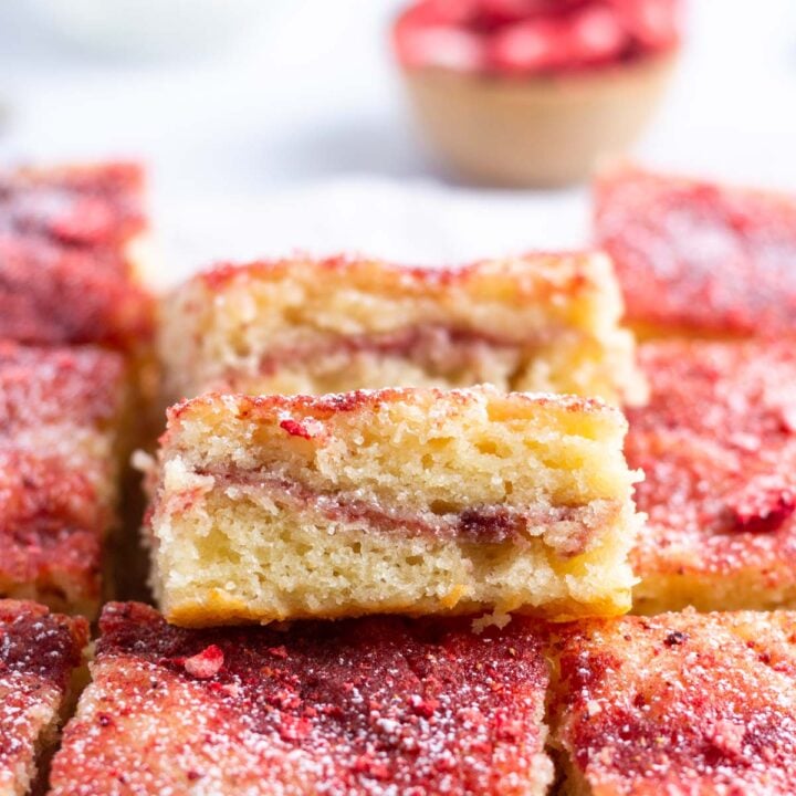 slice of crumb cake showing strawberry filling