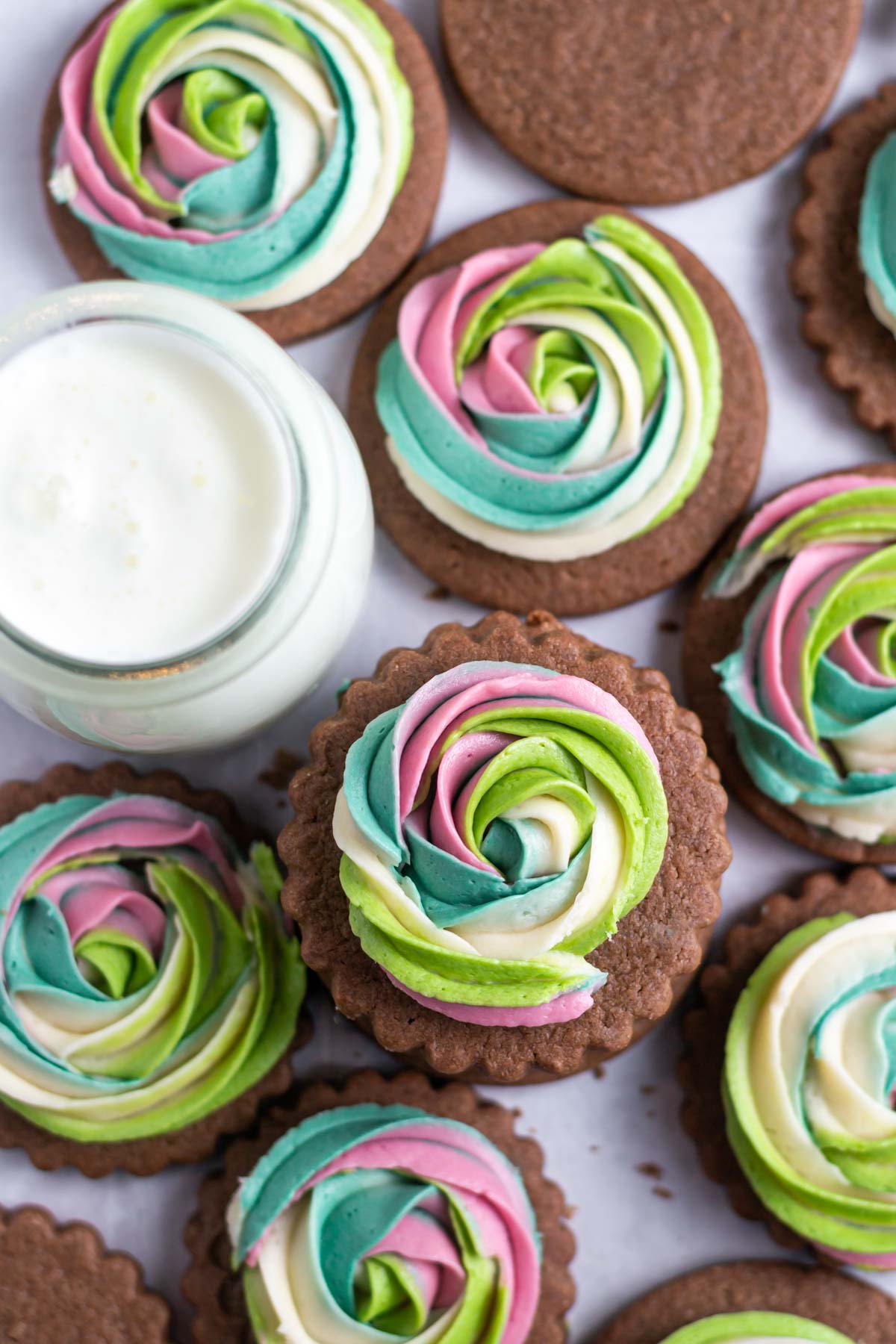 chocolate cut out sugar cookies with buttercream swirls