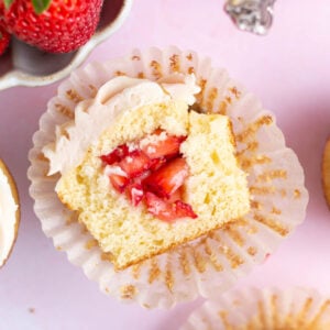 Inside look at a strawberry filled cupcakes.