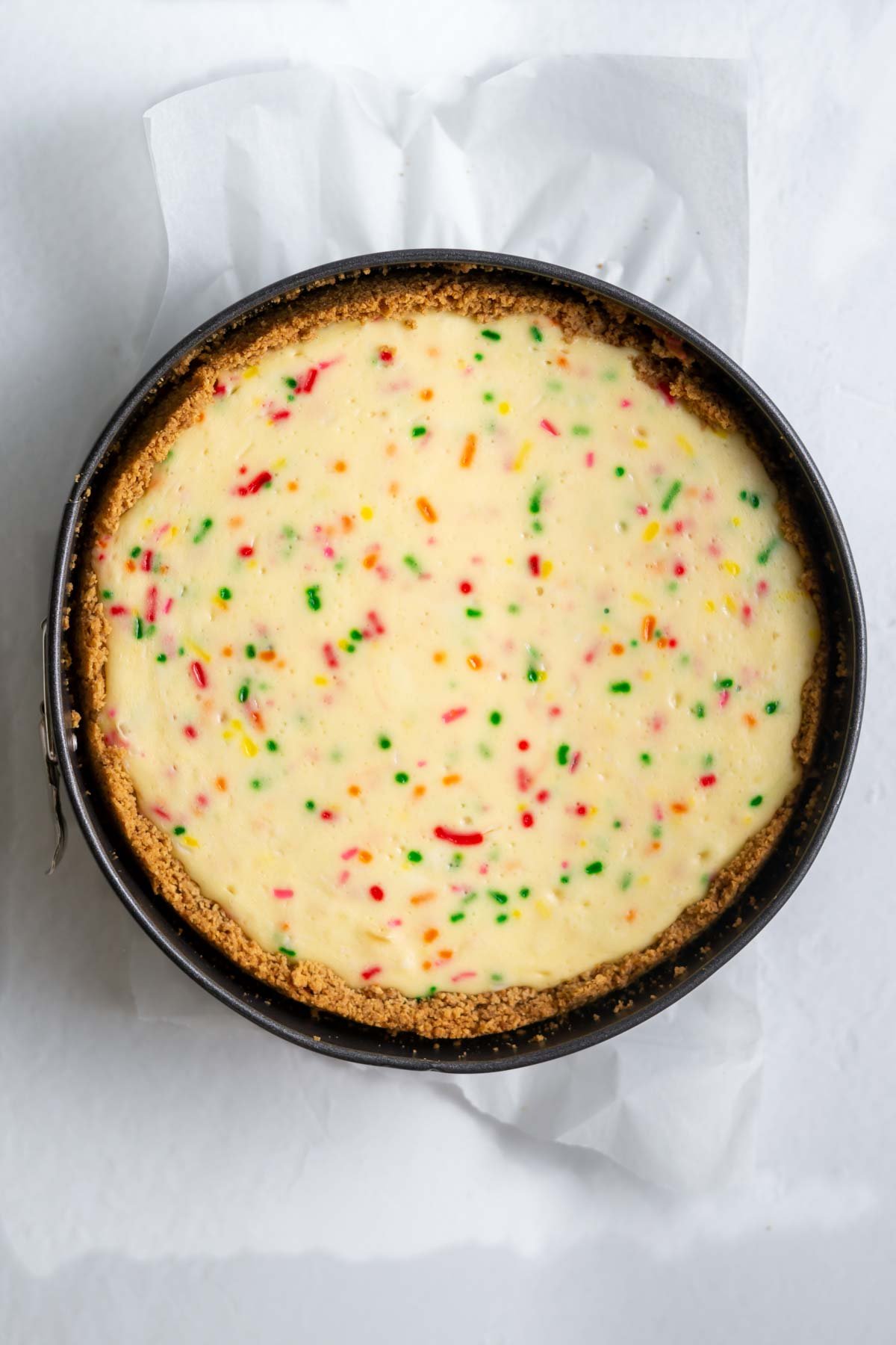 baked birthday cheesecake in a springform pan