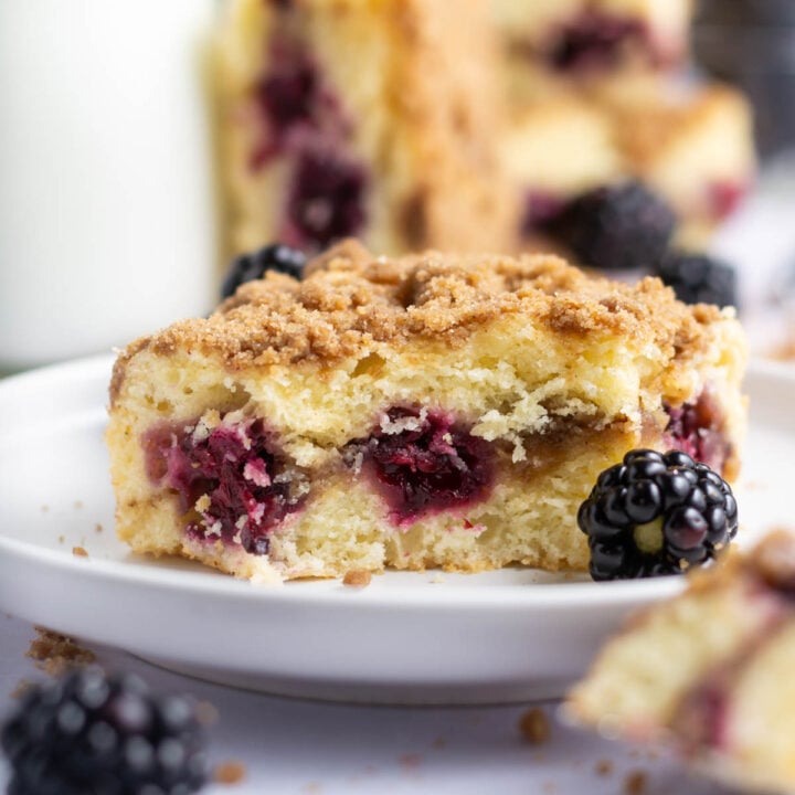 slice of blackberry coffee cake on a plate