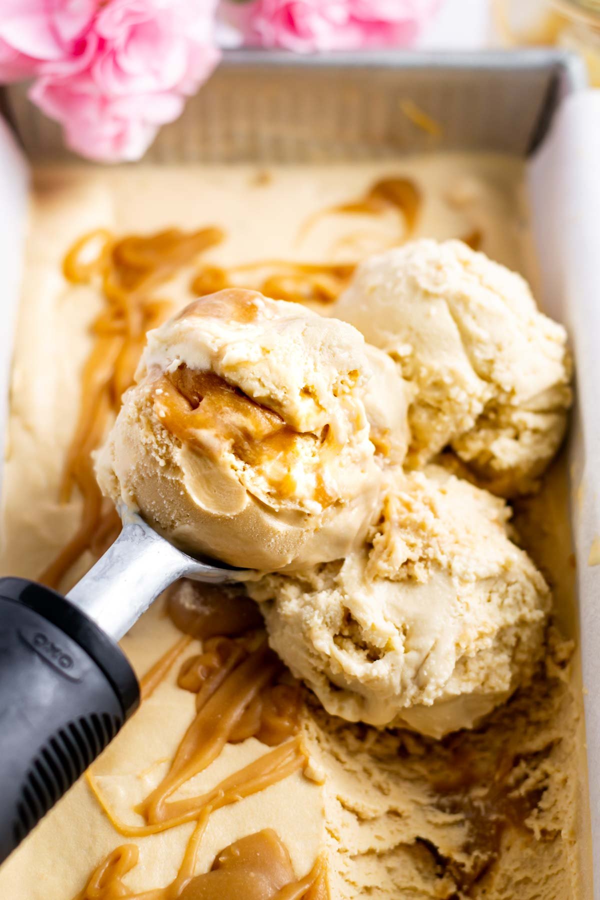 scoops of butterscotch ice cream in a loaf pan