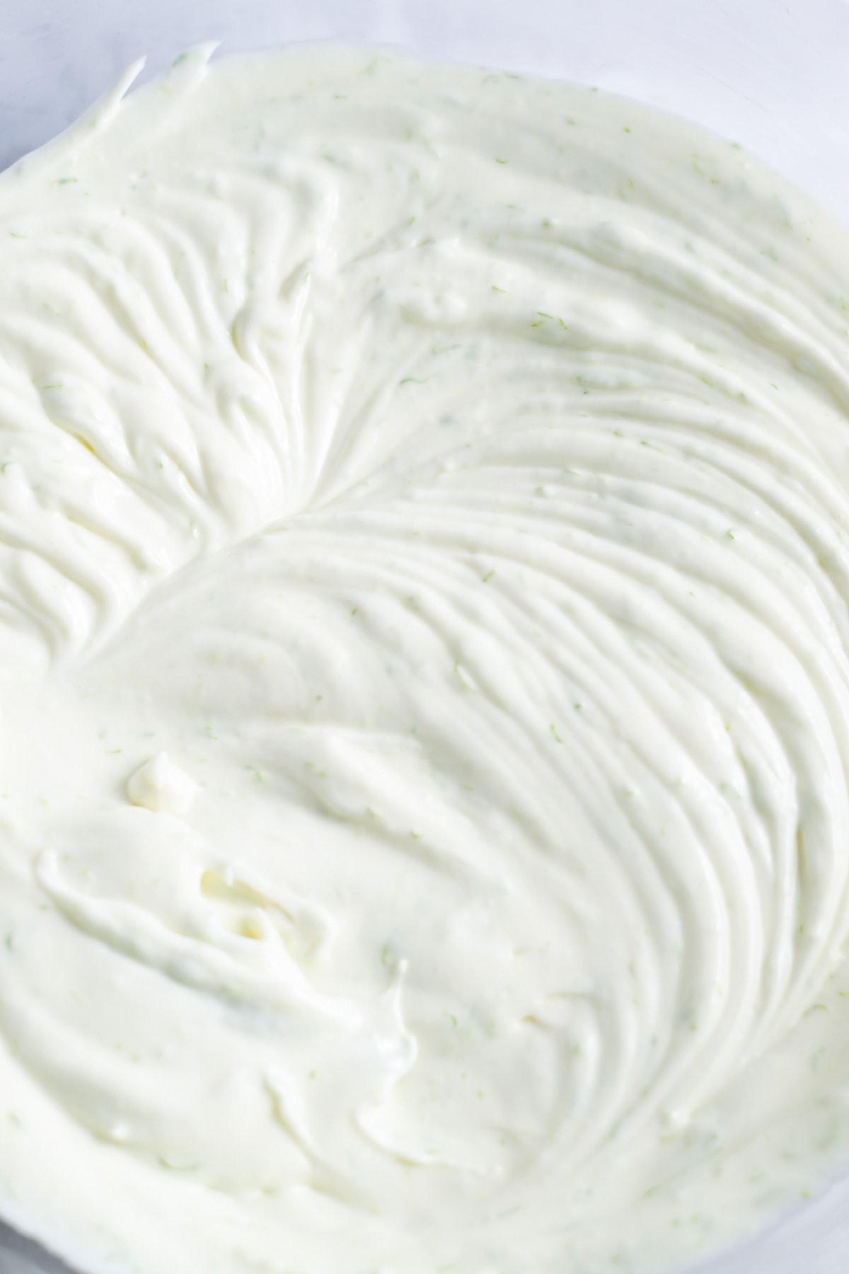 cream cheese, sugar, lime juice and zest mixed together in a bowl