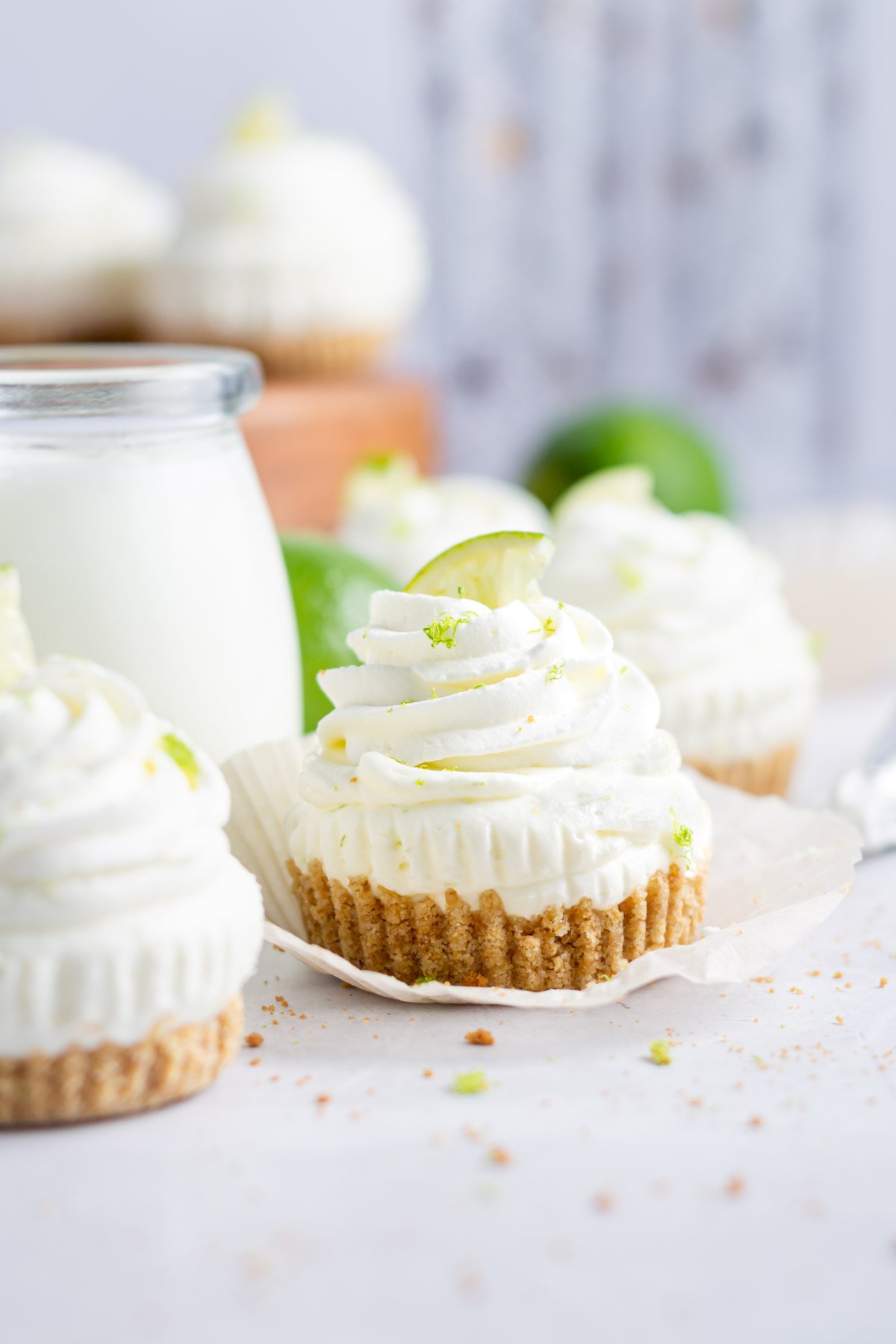mini key lime cheesecake with a glass of milk