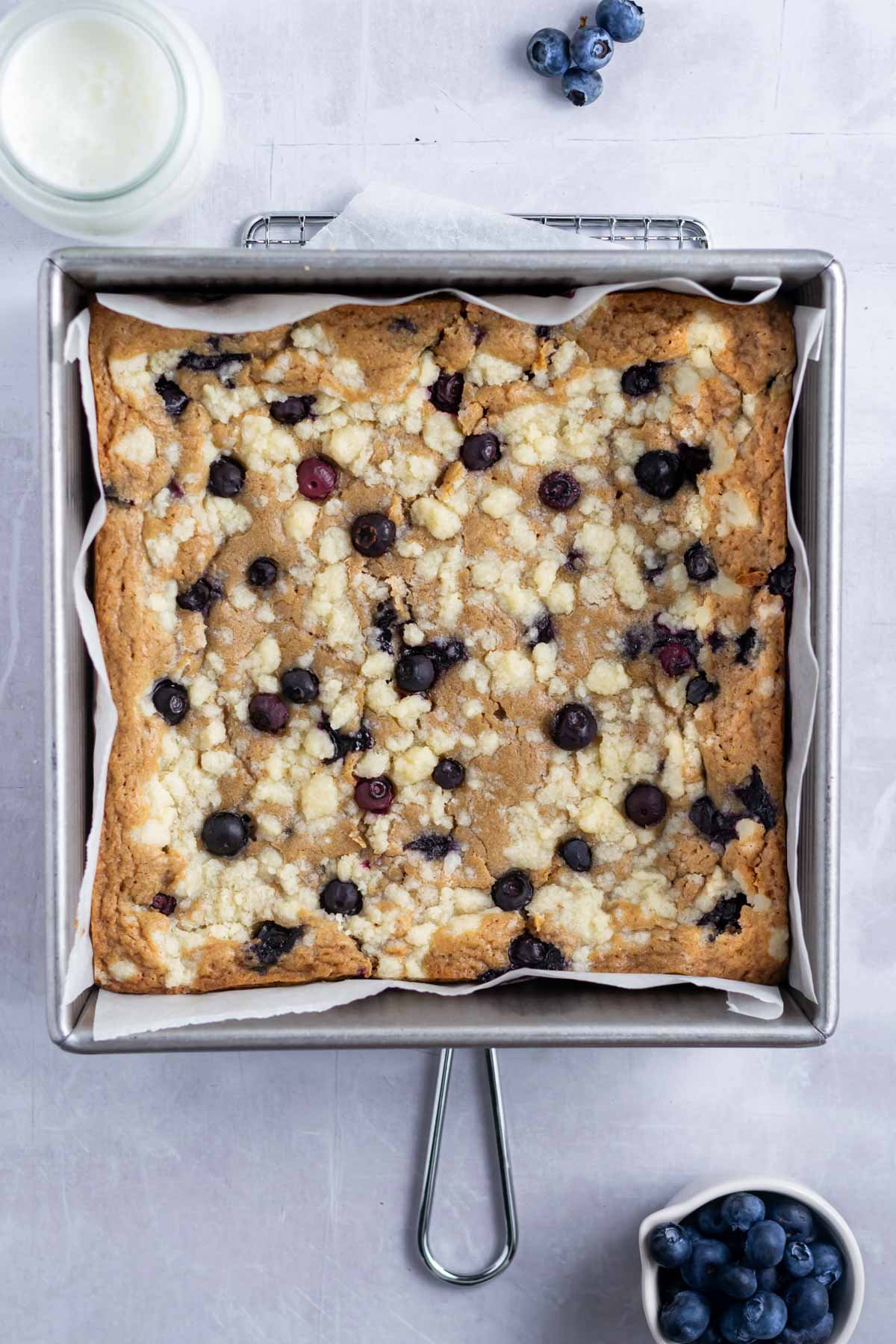 baked blueberry blondies in the baking pan