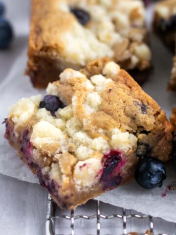 blueberry crumble blondies on a cooling rack