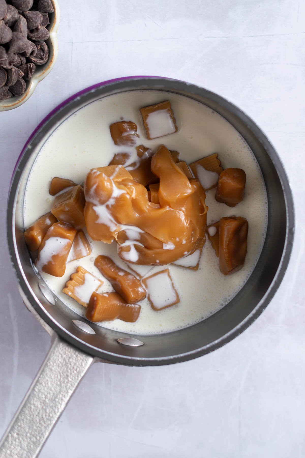 caramels and heavy cream in a small saucepan