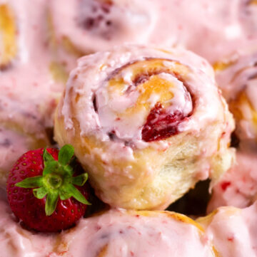 strawberry cinnamon rolls with pink icing