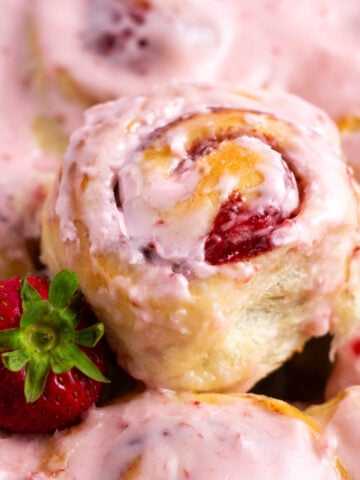 strawberry cinnamon rolls with pink icing