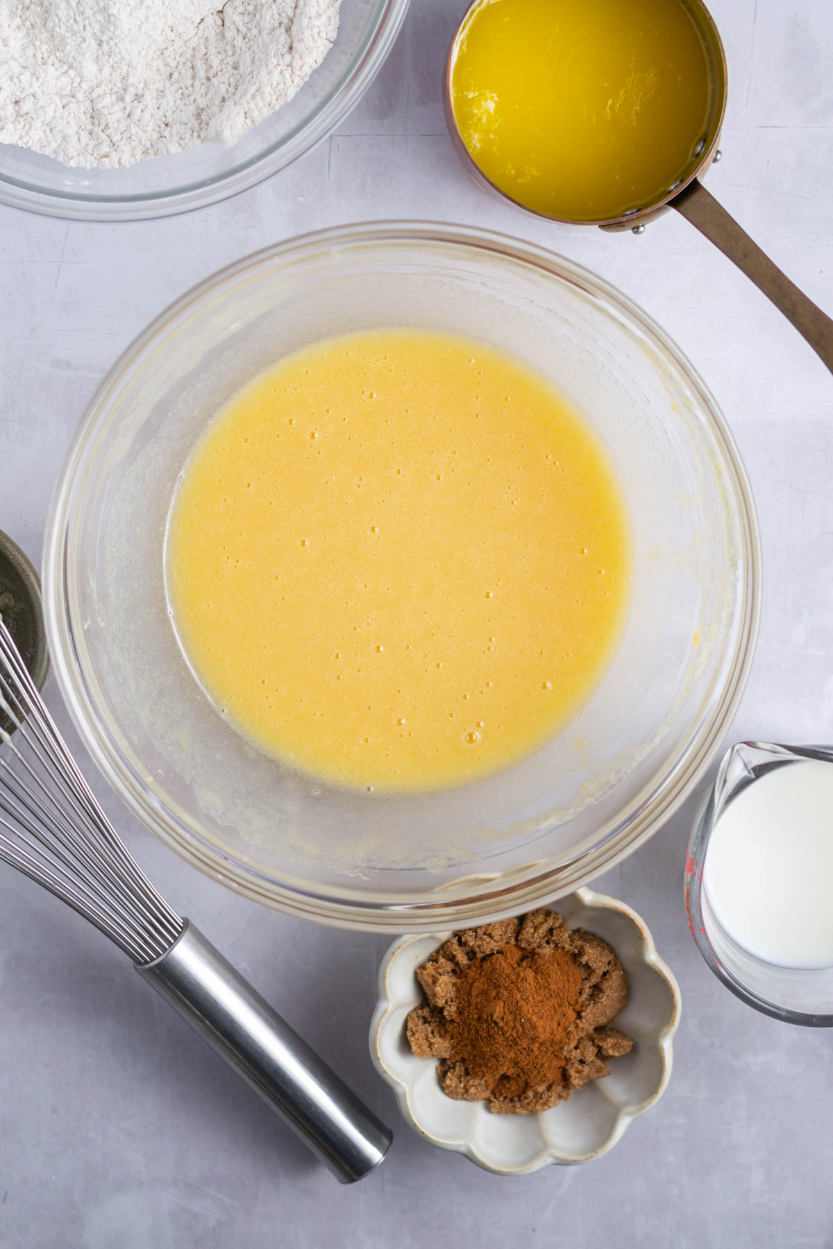 eggs, sugar, vanilla and sour cream whisked together