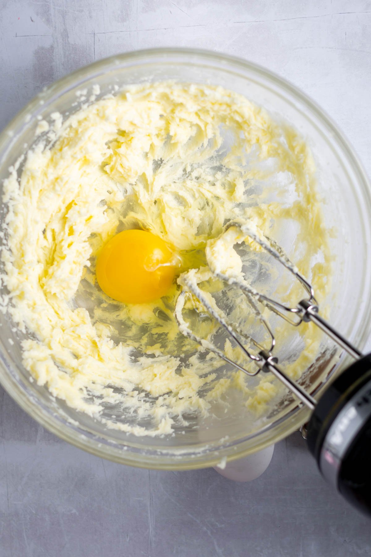 egg added to creamed butter and sugar