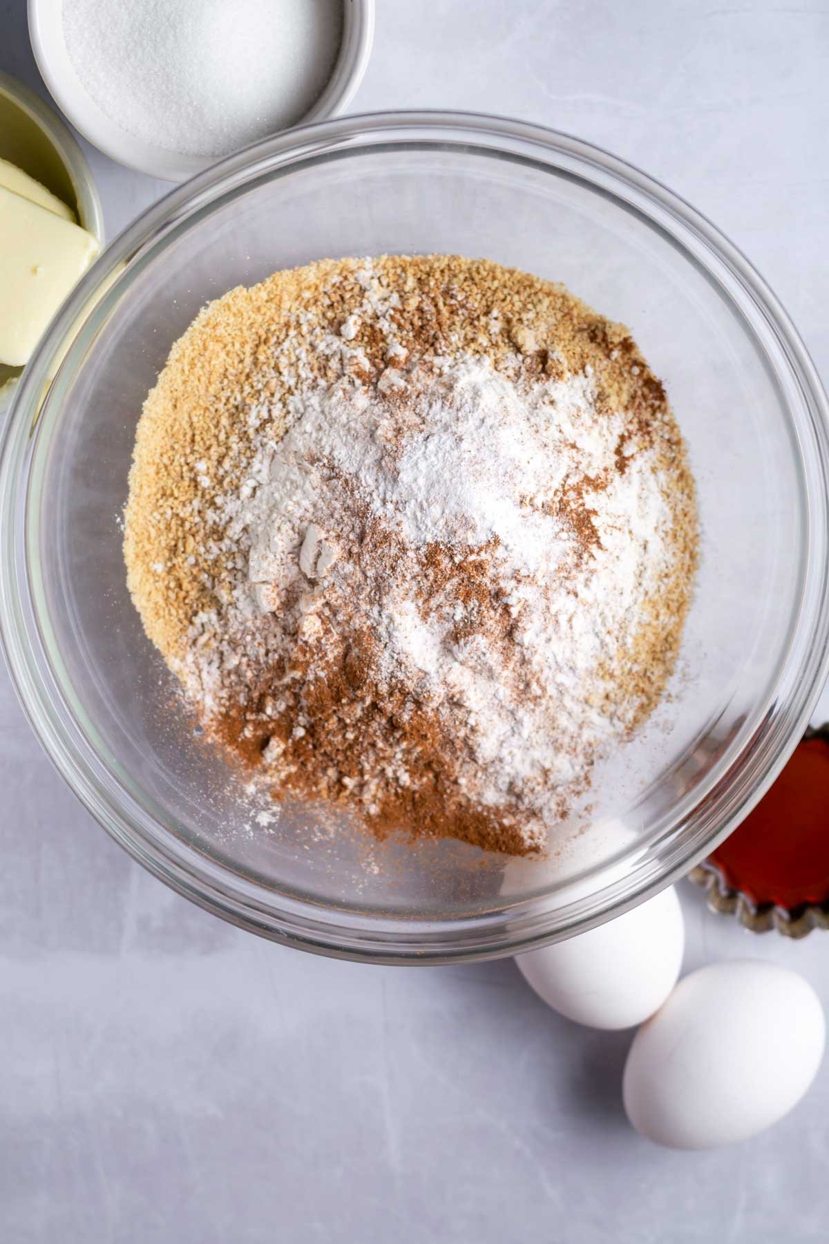 graham crackers, cinnamon, baking powder, and salt in a bowl