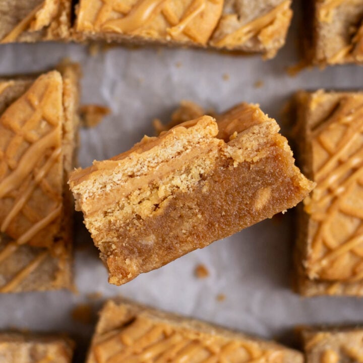 nutter butter bars with one on it's side showing soft and chewy texture
