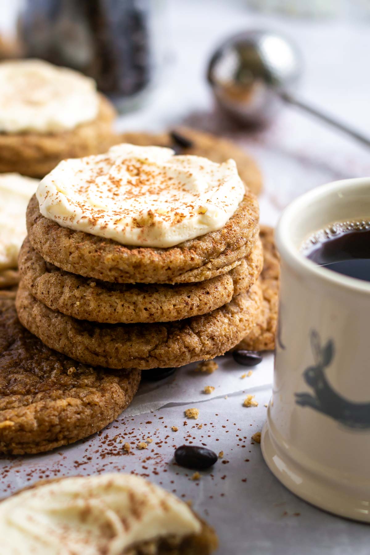 stack of cookies with a cup of coffee