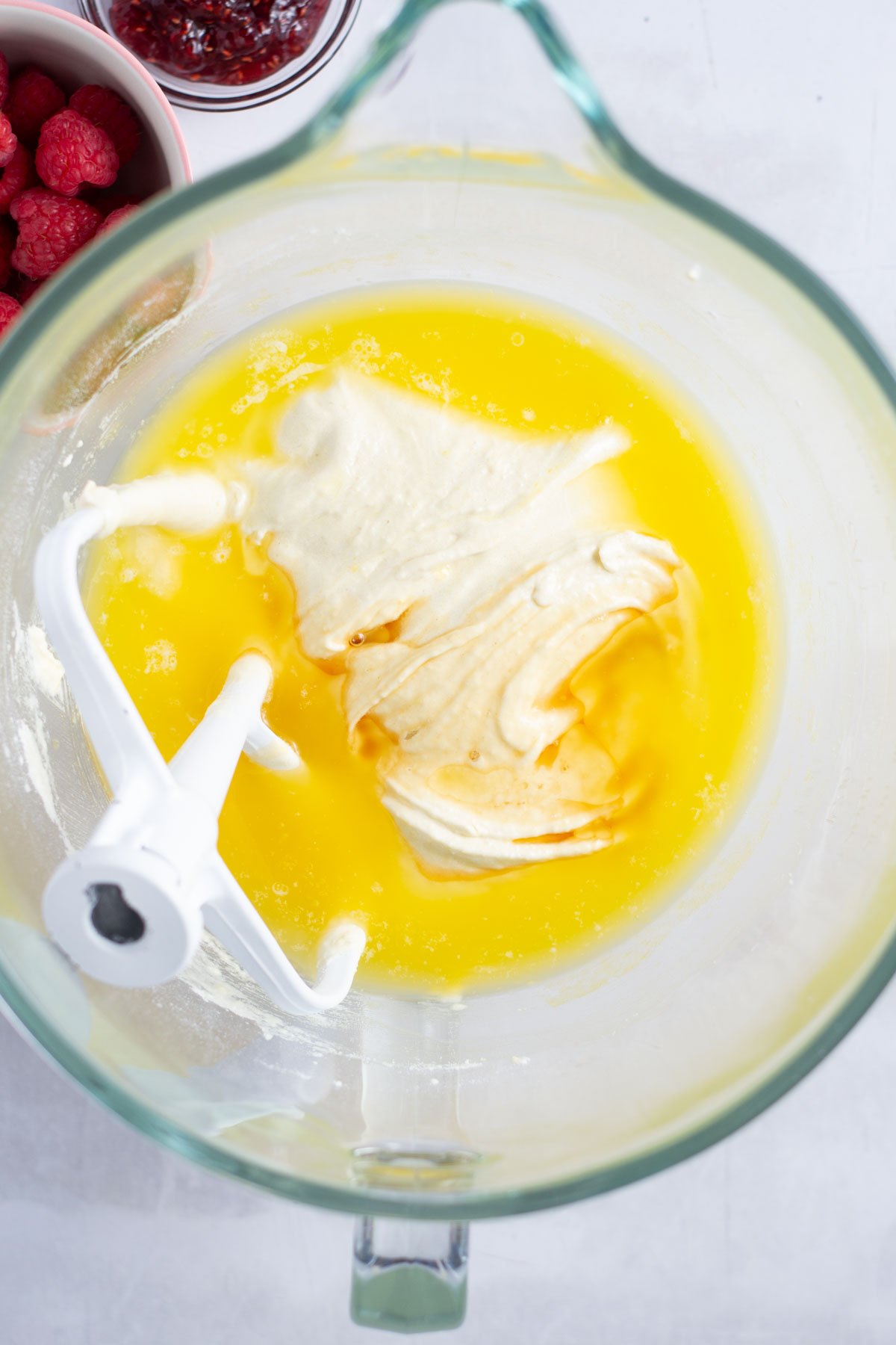 melted butter, vanilla and almond extract added to the cake batter
