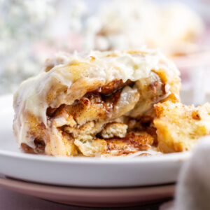 gooey inside of a small batch cinnamon roll sitting on a plate