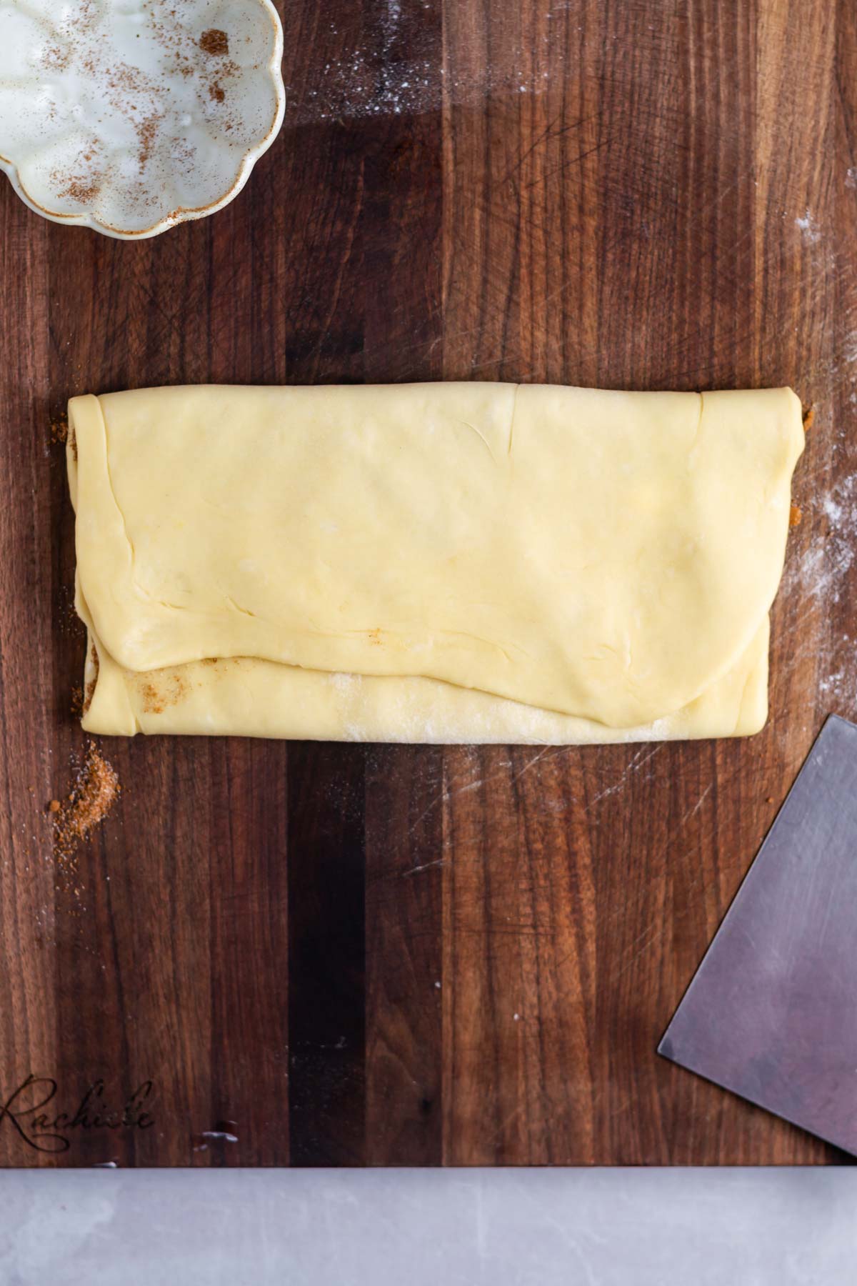 dough folded like a sheet of paper into thirds.