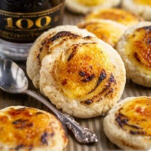 creme brulee cookies with a spoon on a baking pan