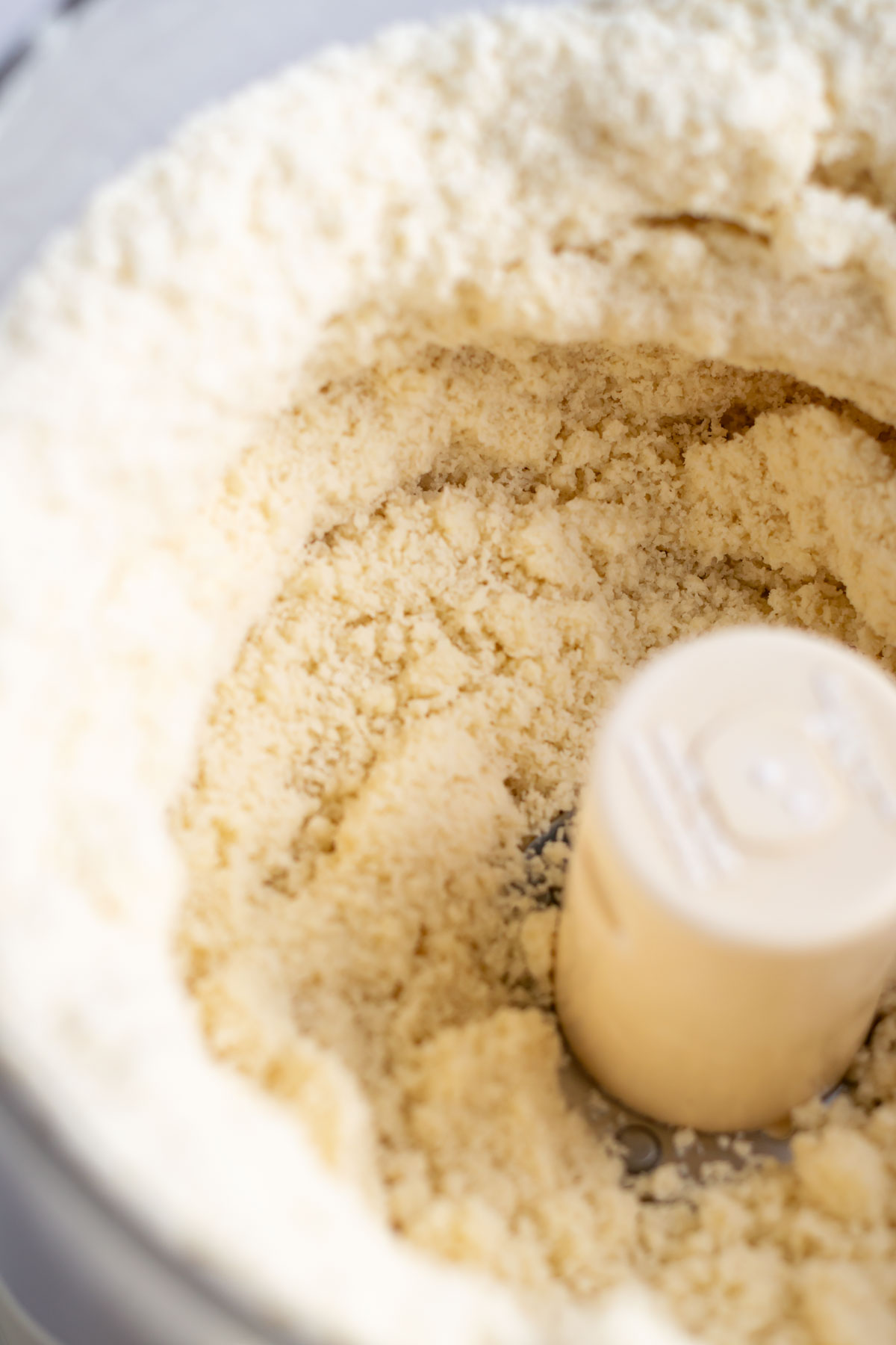 flour, butter, cream cheese and sugar blended in a food processor to look like sand