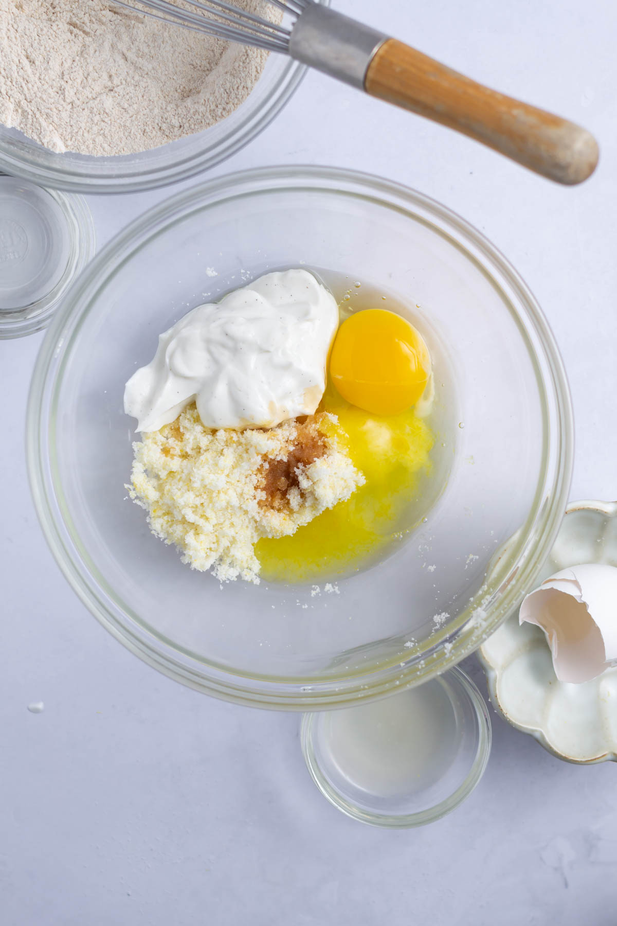 greek yogurt, egg, lemon sugar and vanilla in a mixing bowl.