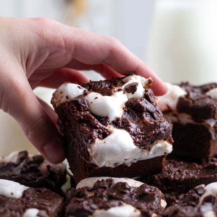 hand grabbing a marshmallow brownie