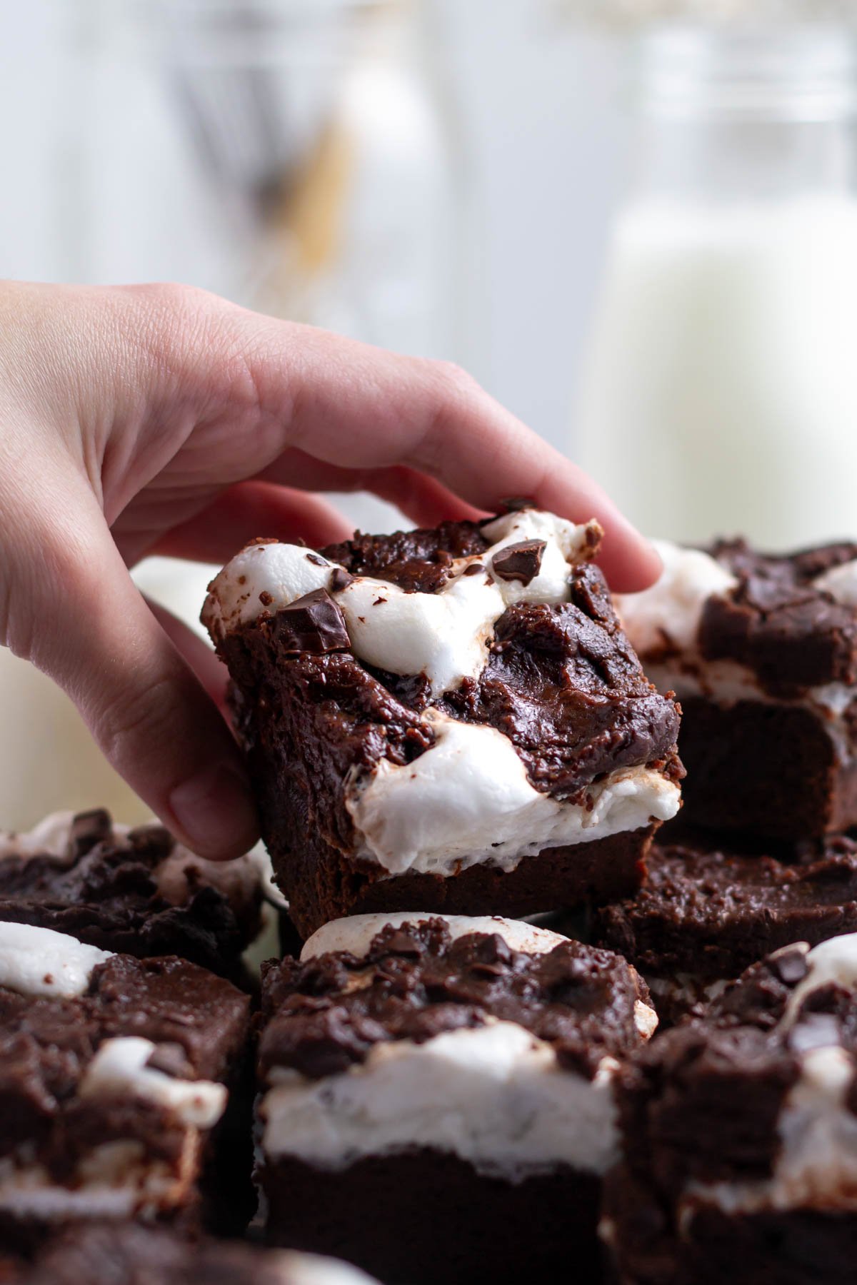 hand grabbing a brownie