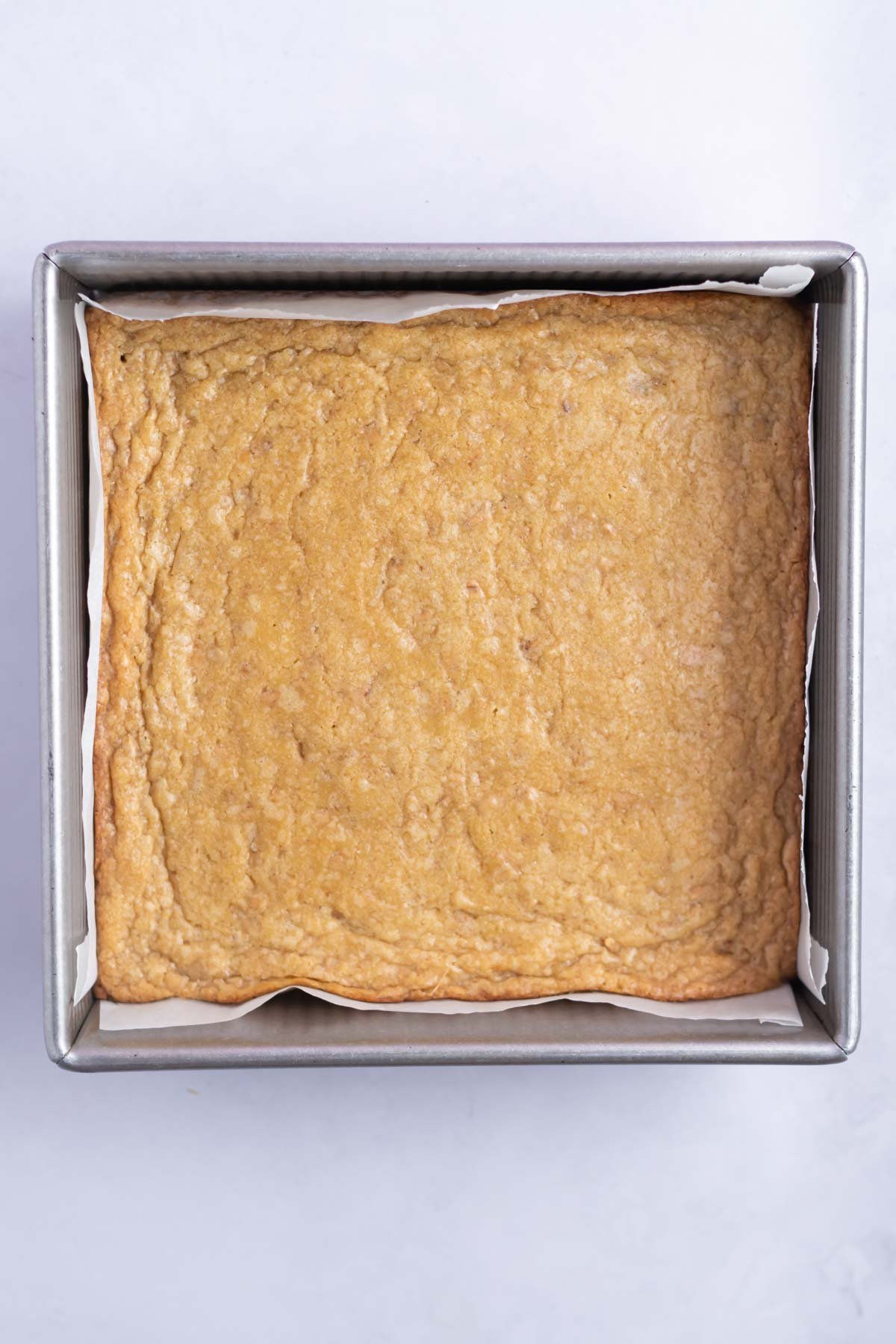 baked blondies in a baking tin