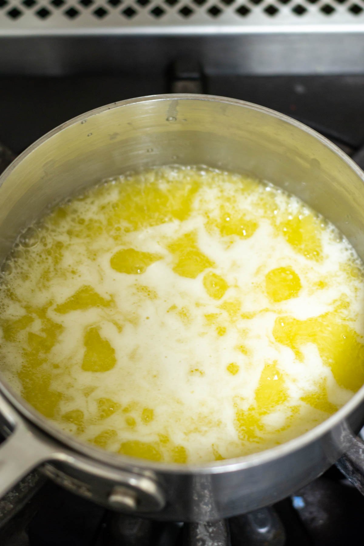 melted butter foaming in a saucepan