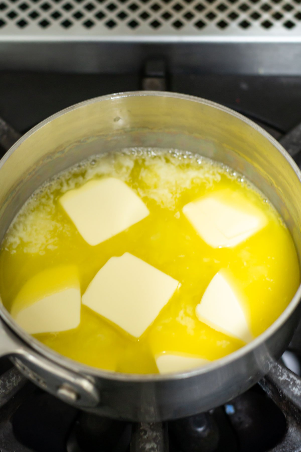 butter cubes melting in a saucepan