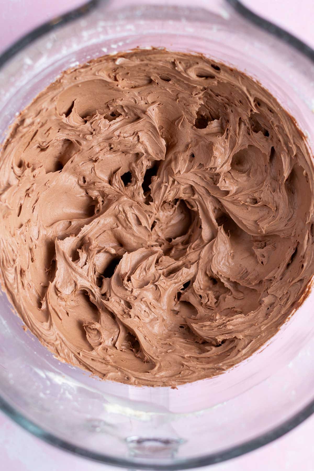 chocolate fudge frosting in a mixing bowl