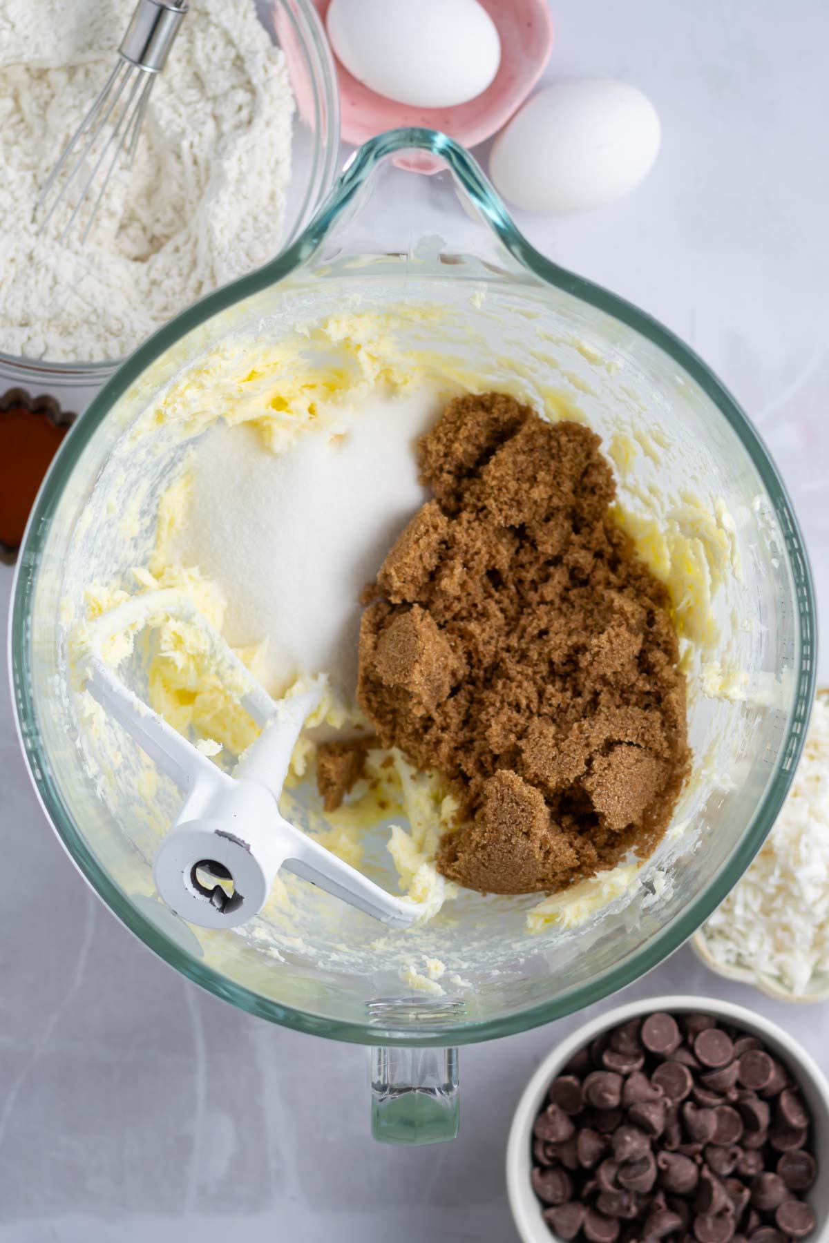 brown sugar and granulated sugar in a mixing bowl with butter