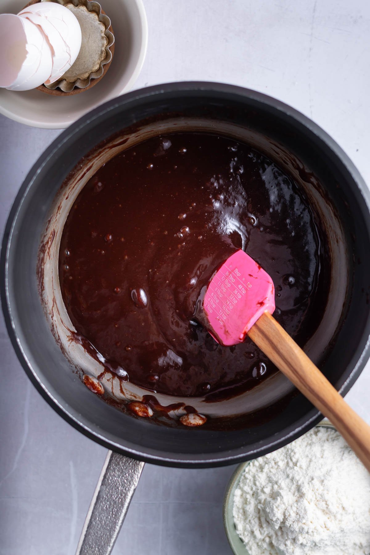 oreo brownie batter before flour is added in a saucepan