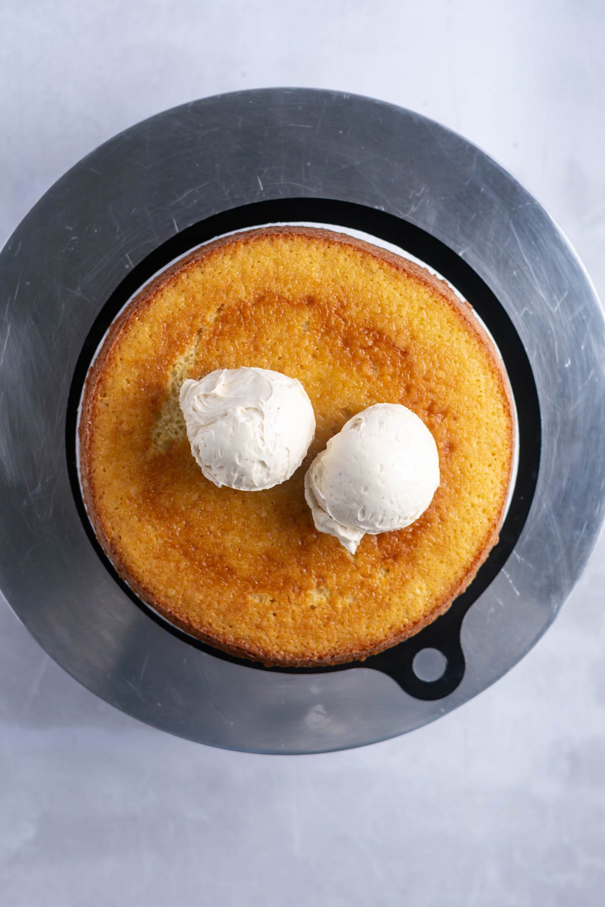 vanilla bean buttercream on top of cake layer