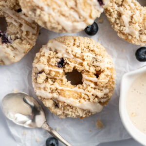 overhead look at a blueberry donut with crumble topping