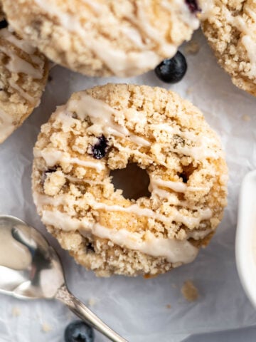 overhead look at a blueberry donut with crumble topping