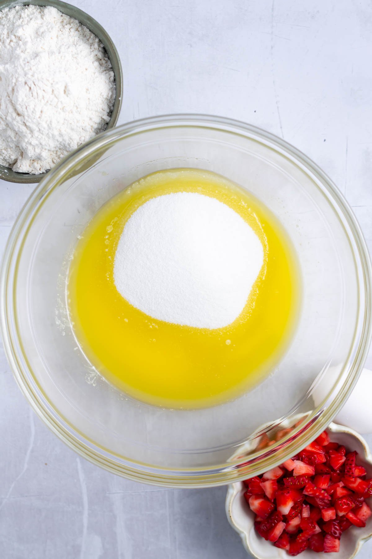 sugar and melted butter in a mixing bowl