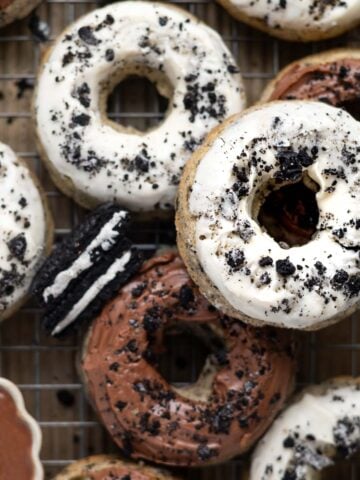 oreo donuts on a cooling rack with extra cookies