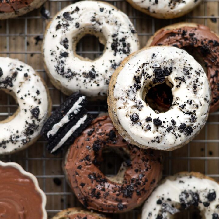 oreo donuts on a cooling rack with extra cookies