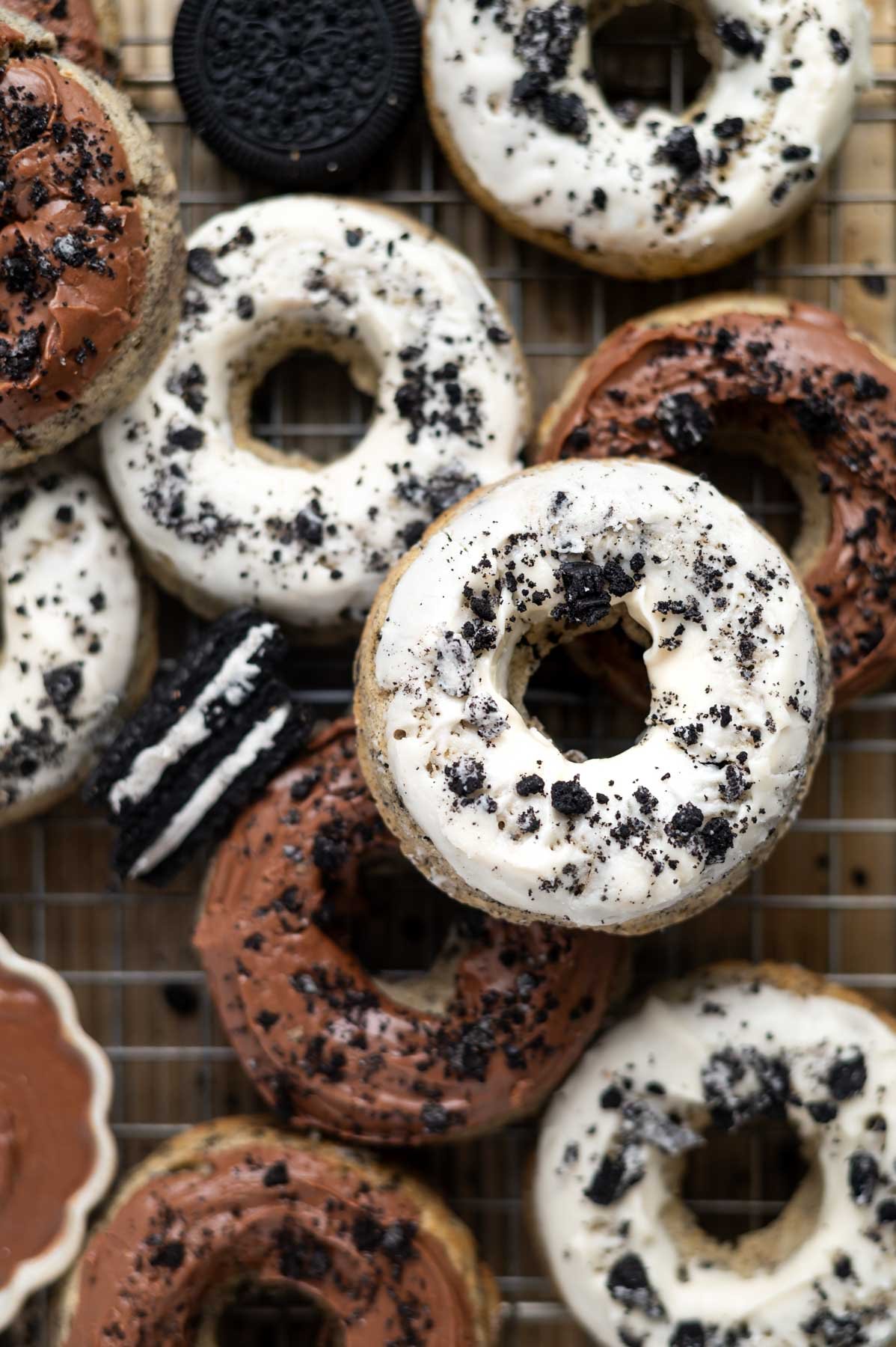 oreo donuts on a cooling rack with extra cookies