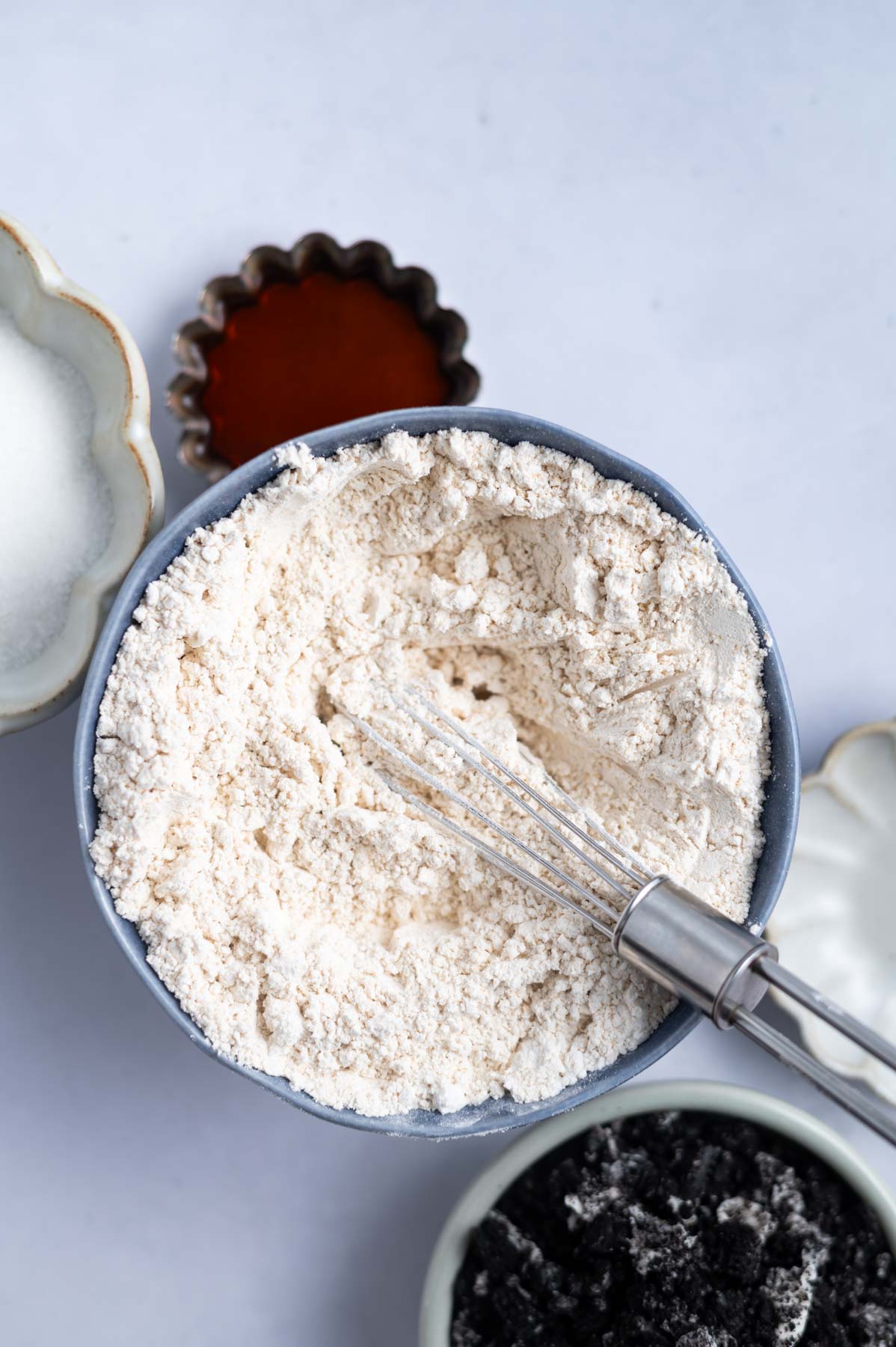 dry ingredients in a bowl with a whisk