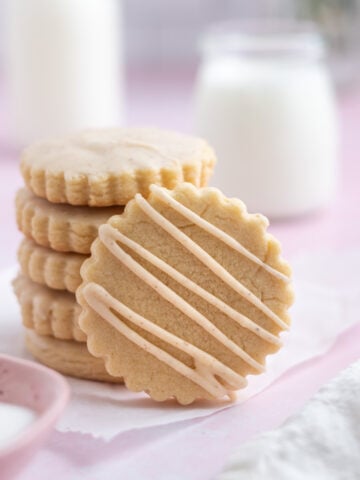 stack of brown butter sugar cookies with icing