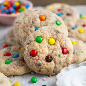 m&m sugar cookies with a bowl of mini candies