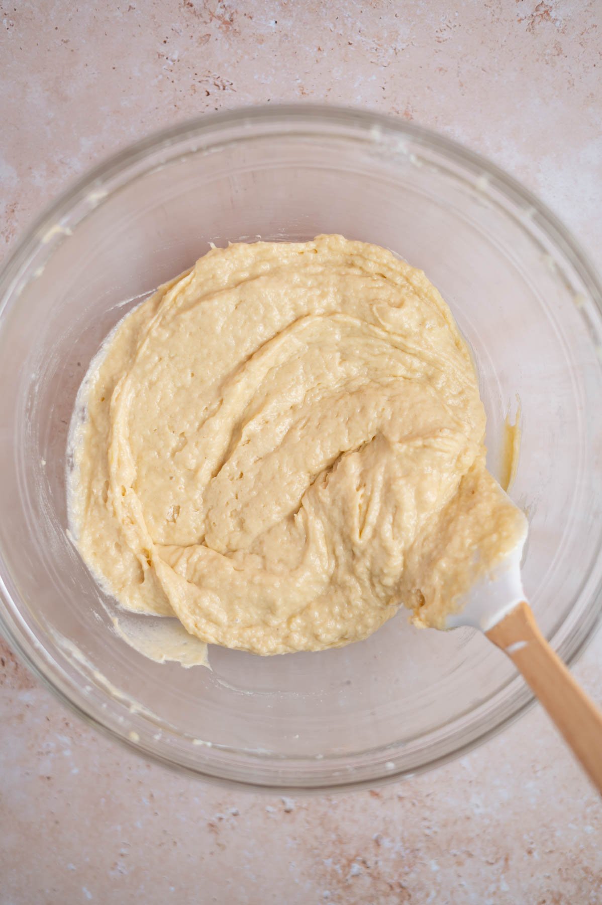 coffee cake batter in a bowl with a spatula