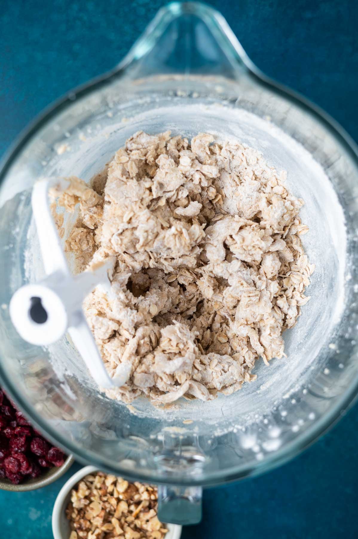 flour mixed into cookie dough in a mixing bowl