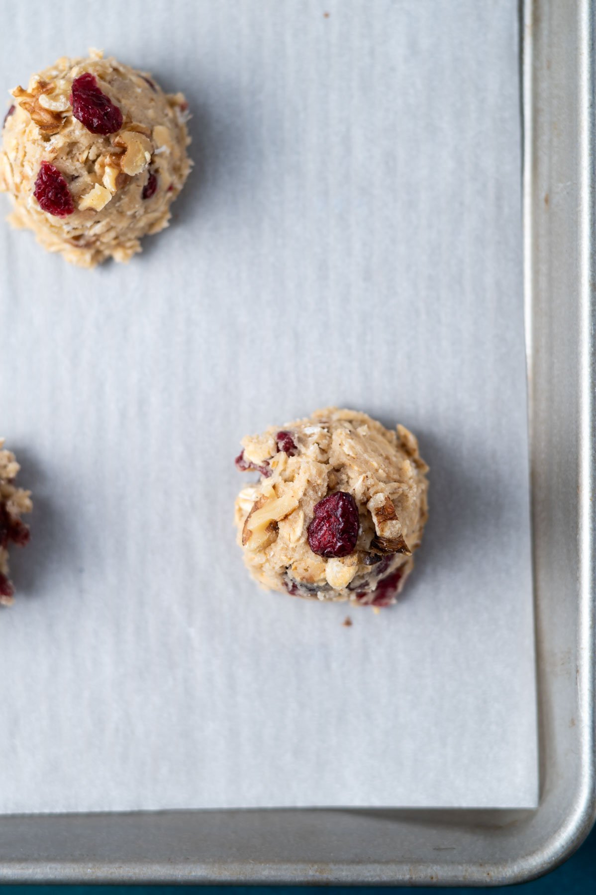 cookie dough on a parchment lined baking sheet