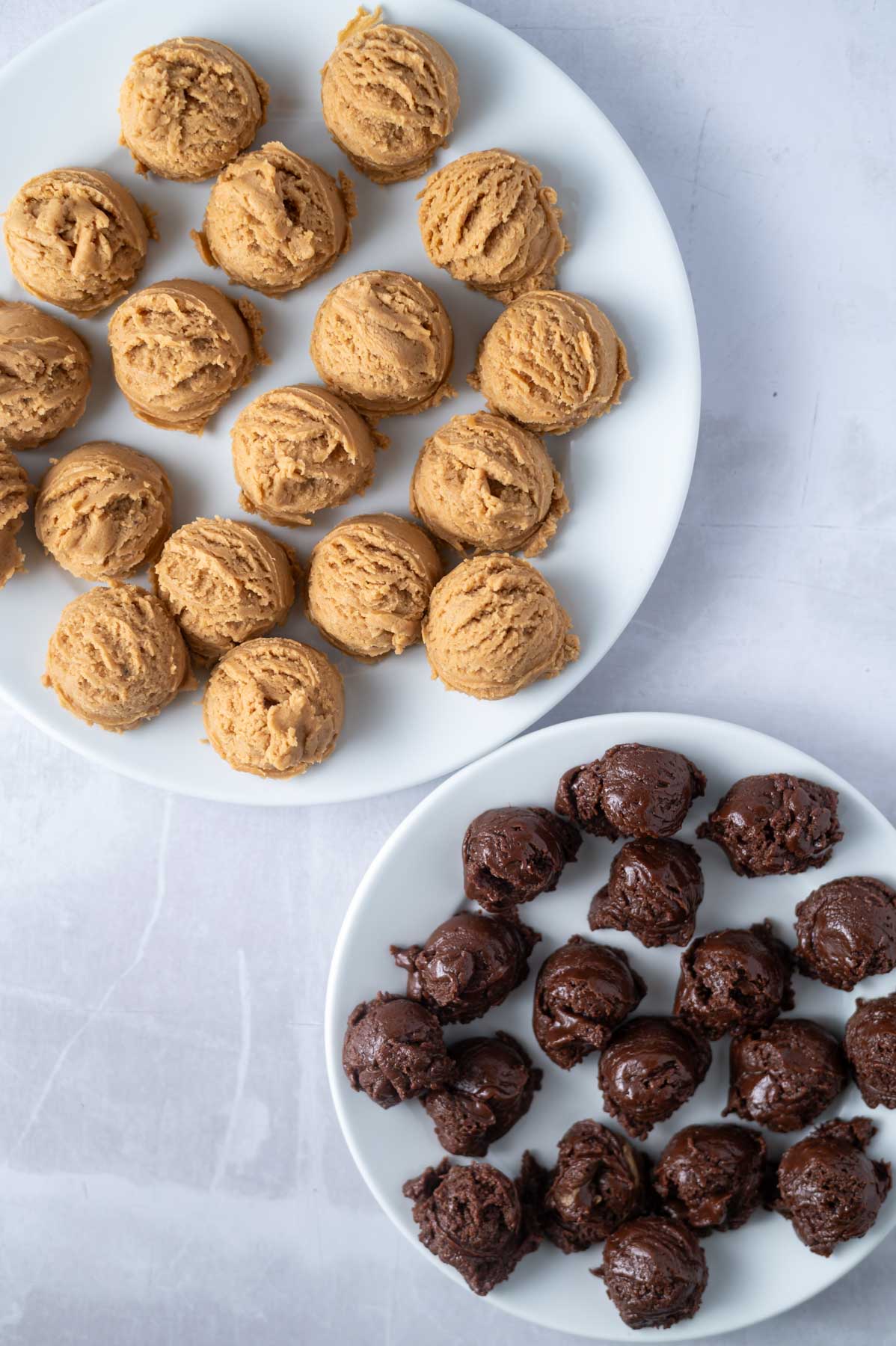 peanut butter and nutella cookie dough balls on plates