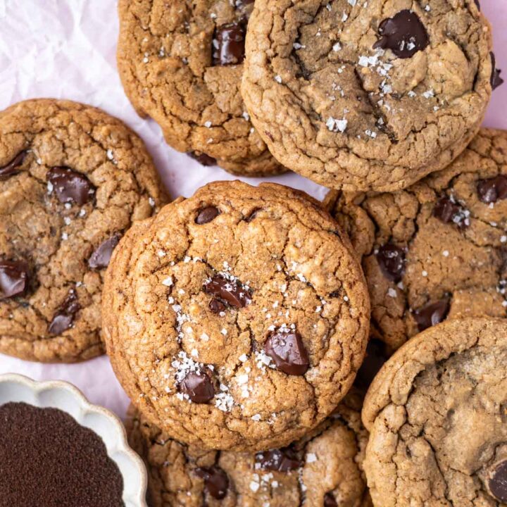 salted espresso chocolate chip cookies with a bowl of espresso powder