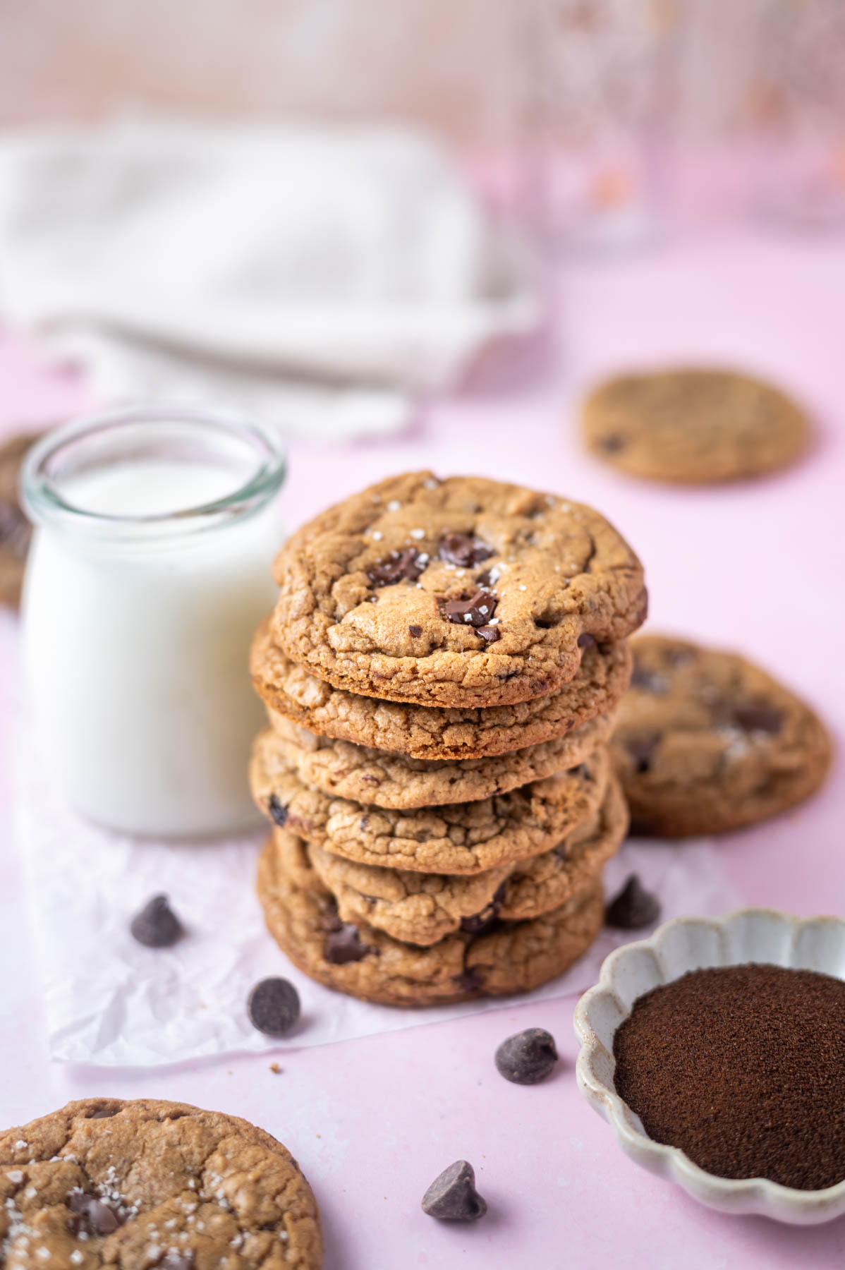 stack of espresso chocolate chip cookies with a glass of milk