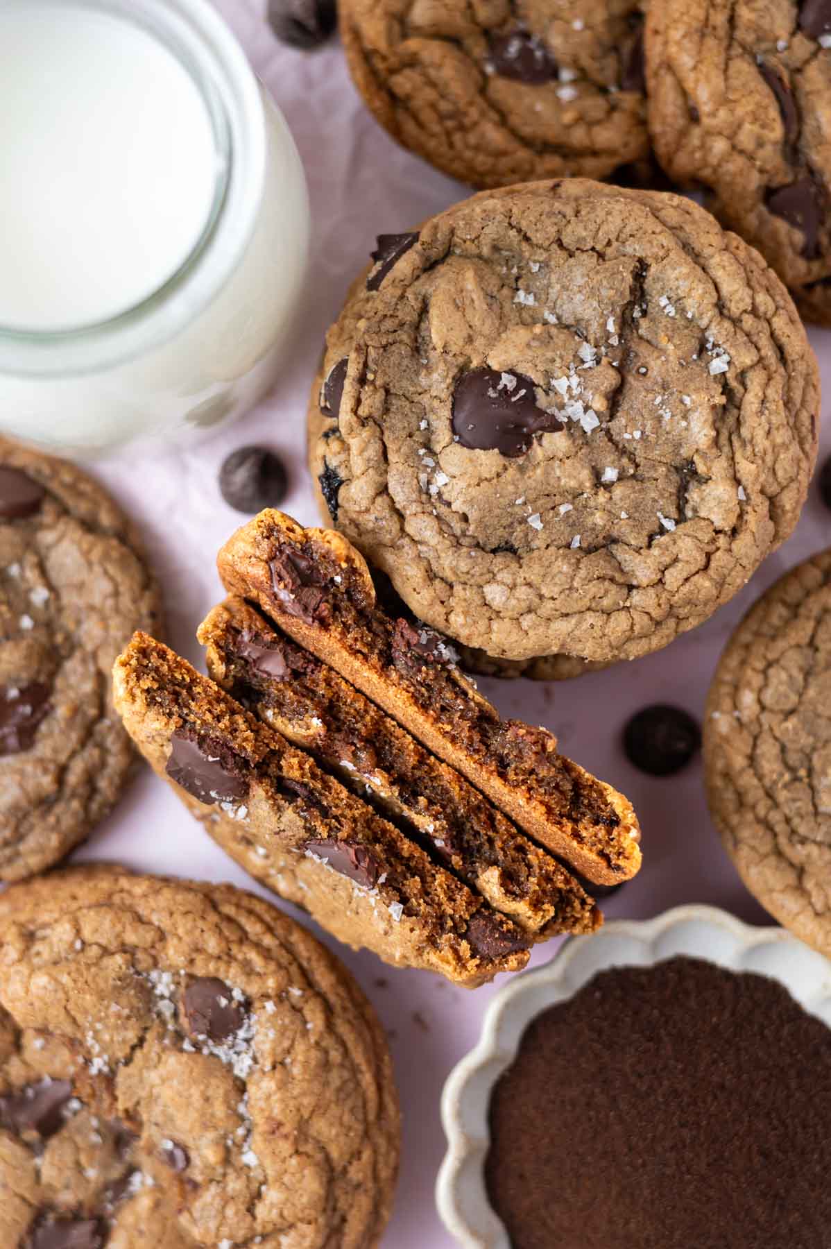 espresso chocolate chip cookies with milk and a bowl of espresso powder