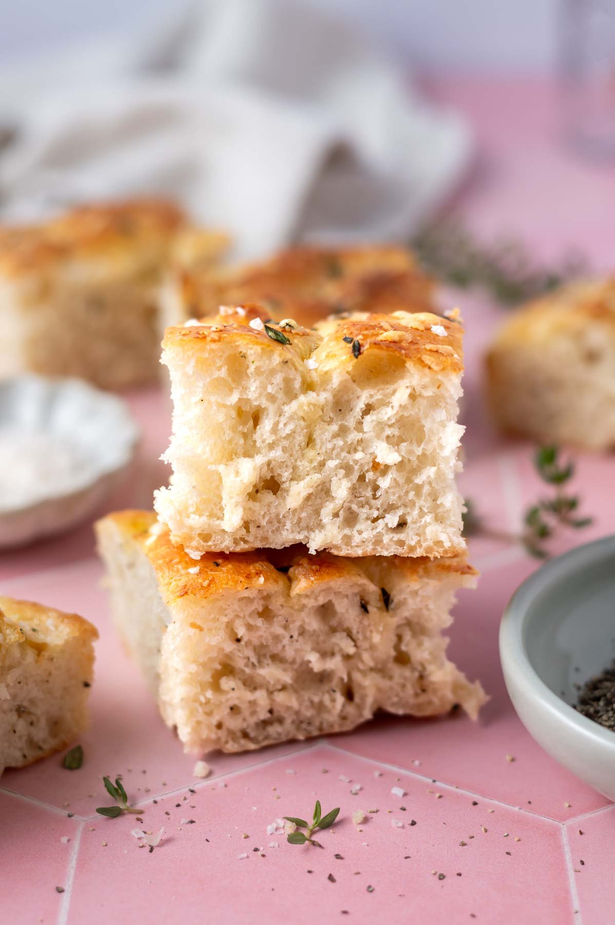 stack of two slices of black pepper focaccia